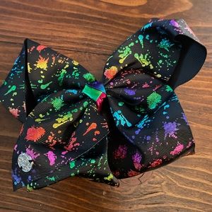 Jojo Siwa signature collection Black Multi Color Splatter Bow hair clip.